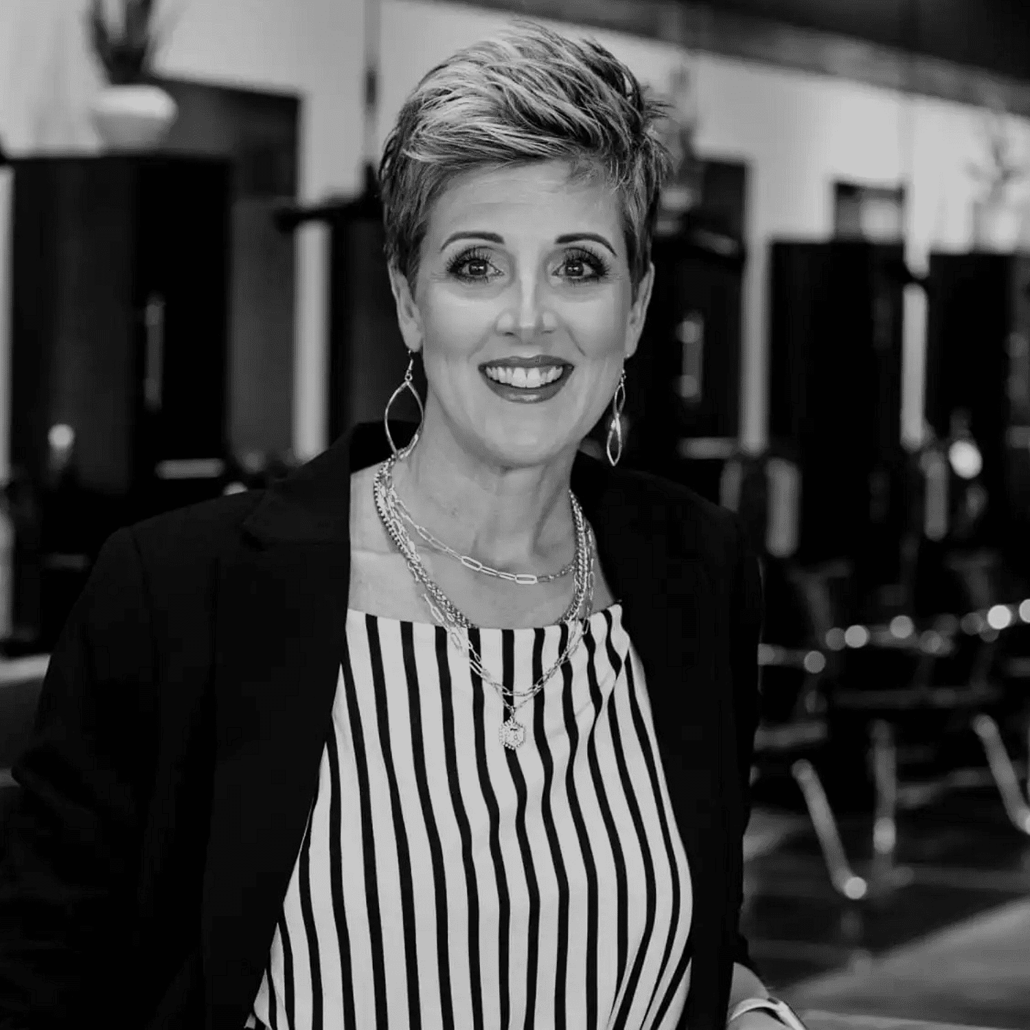 Portrait of Tanya Winterhalter, a professional stylist at Salon361, showcasing their expertise and style.