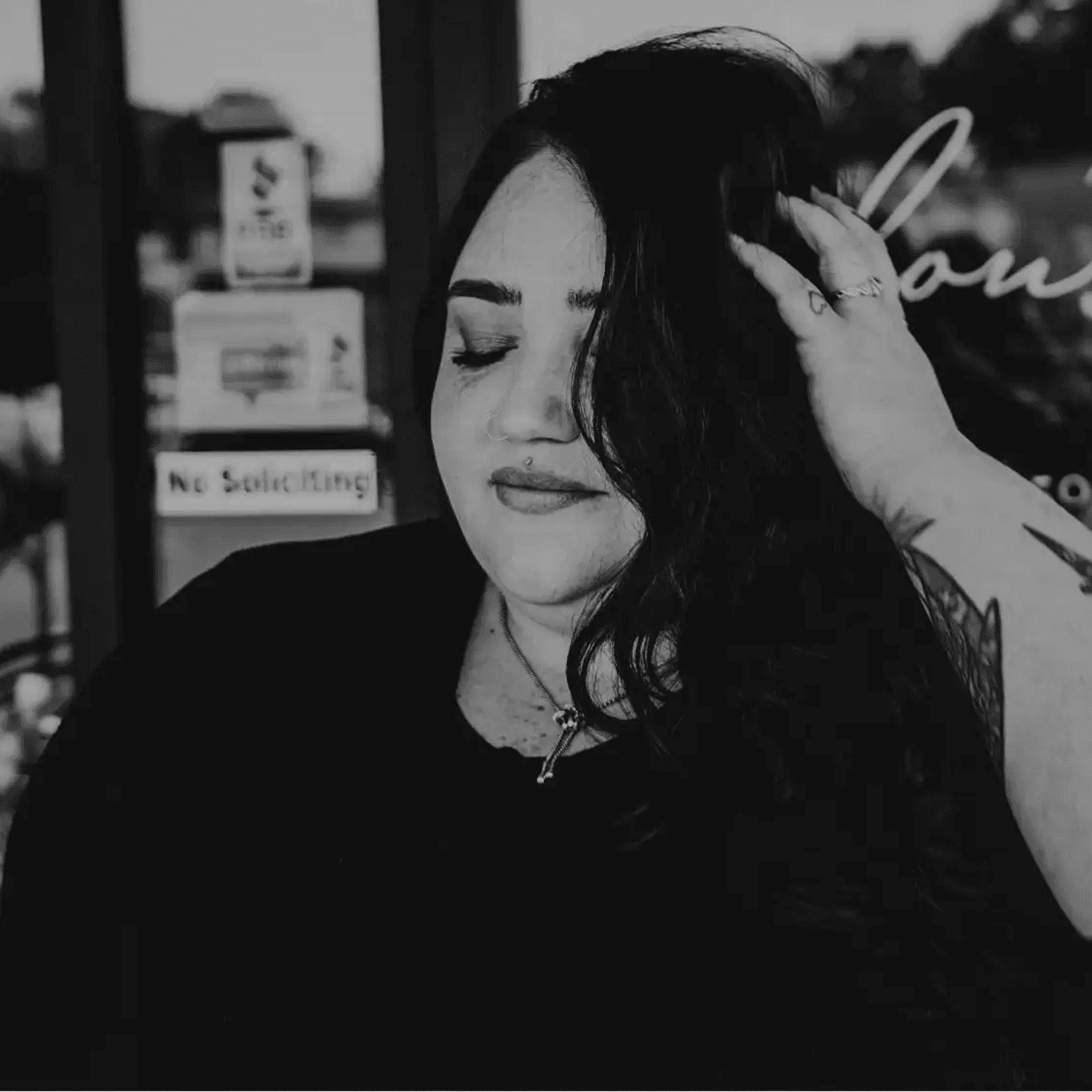 Portrait of Kayla Abrams, a professional stylist at Salon361, showcasing their expertise and style.