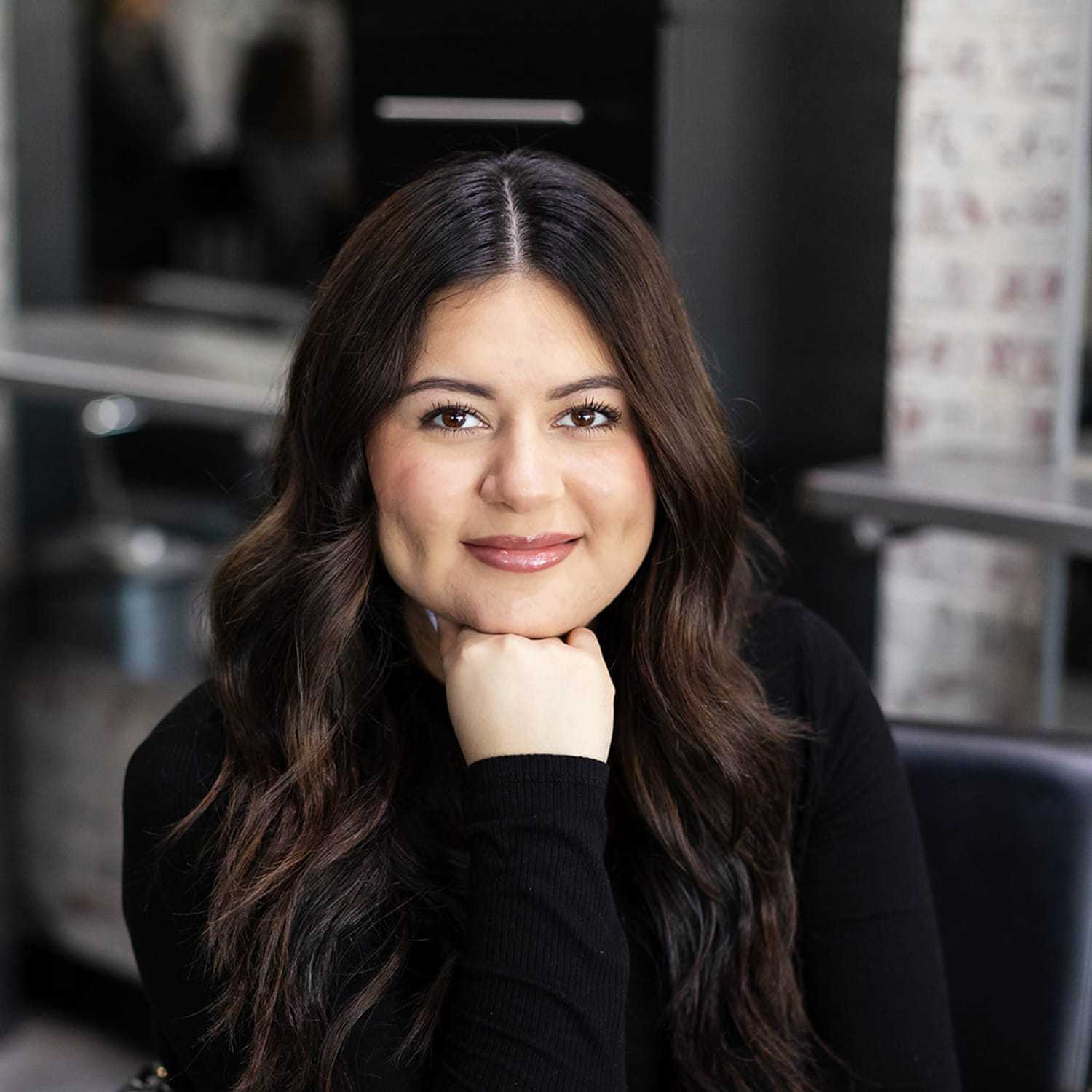 Portrait of Gabby Rivera, a professional stylist at Salon361, showcasing their expertise and style.