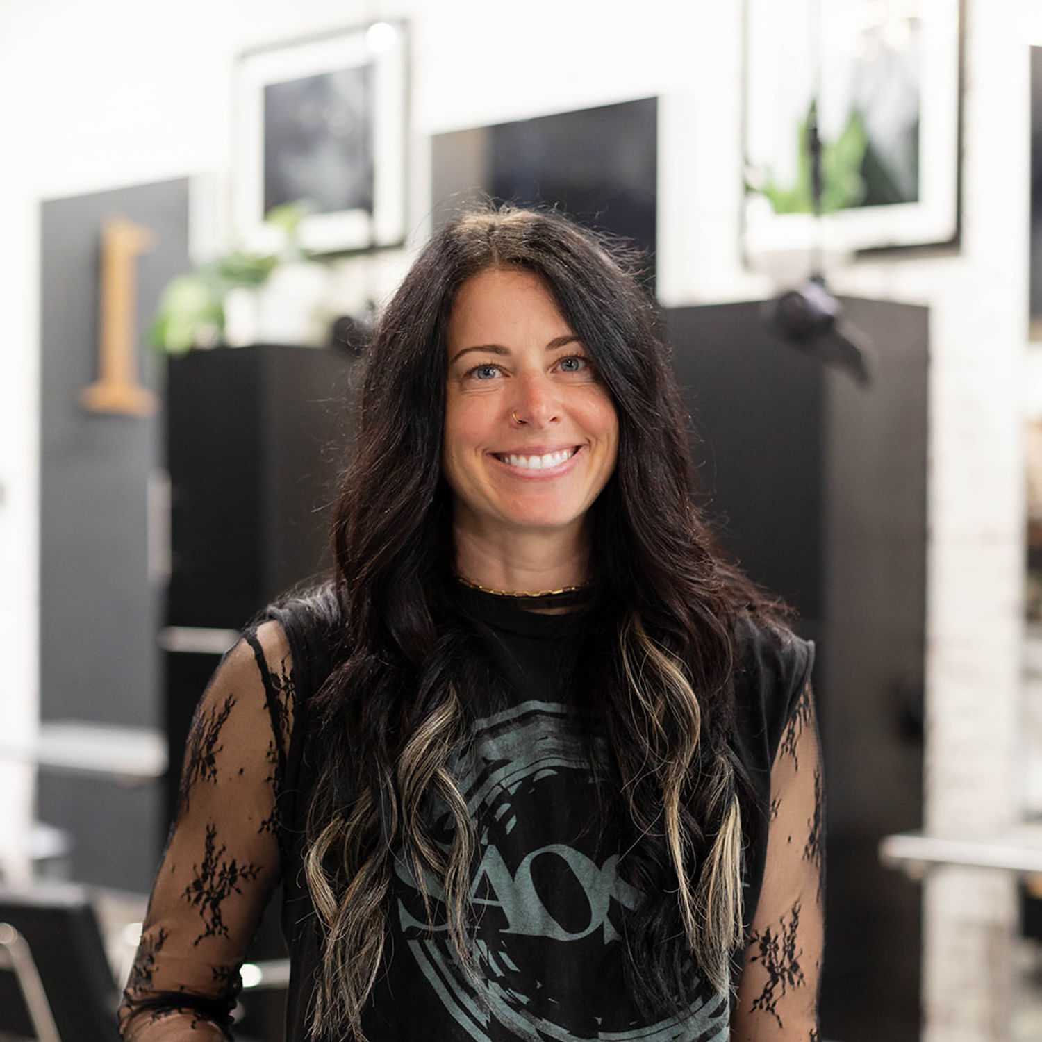 Portrait of Danielle Capaldi, a professional stylist at Salon361, showcasing their expertise and style.