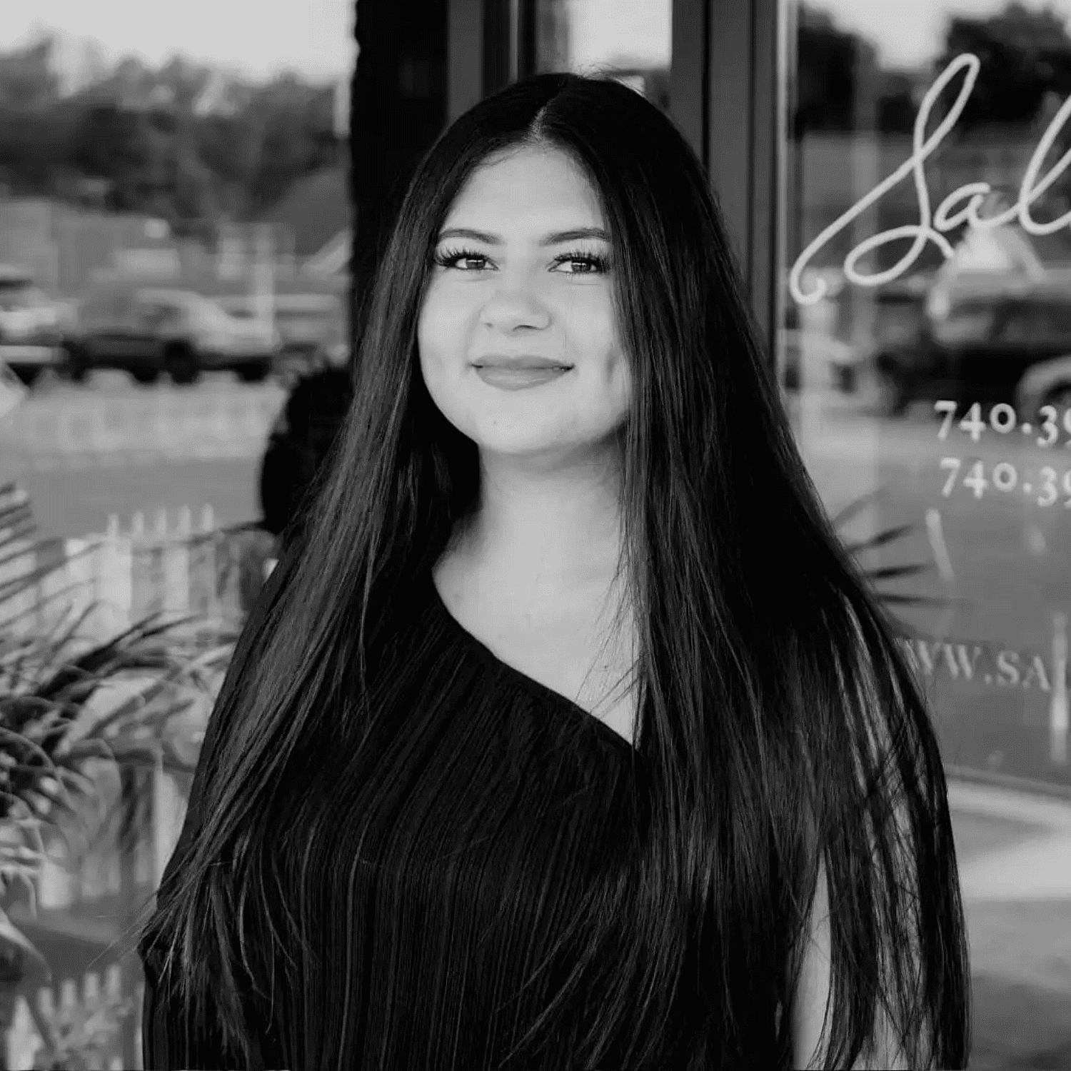 Portrait of Gabby Rivera, a professional stylist at Salon361, showcasing their expertise and style.