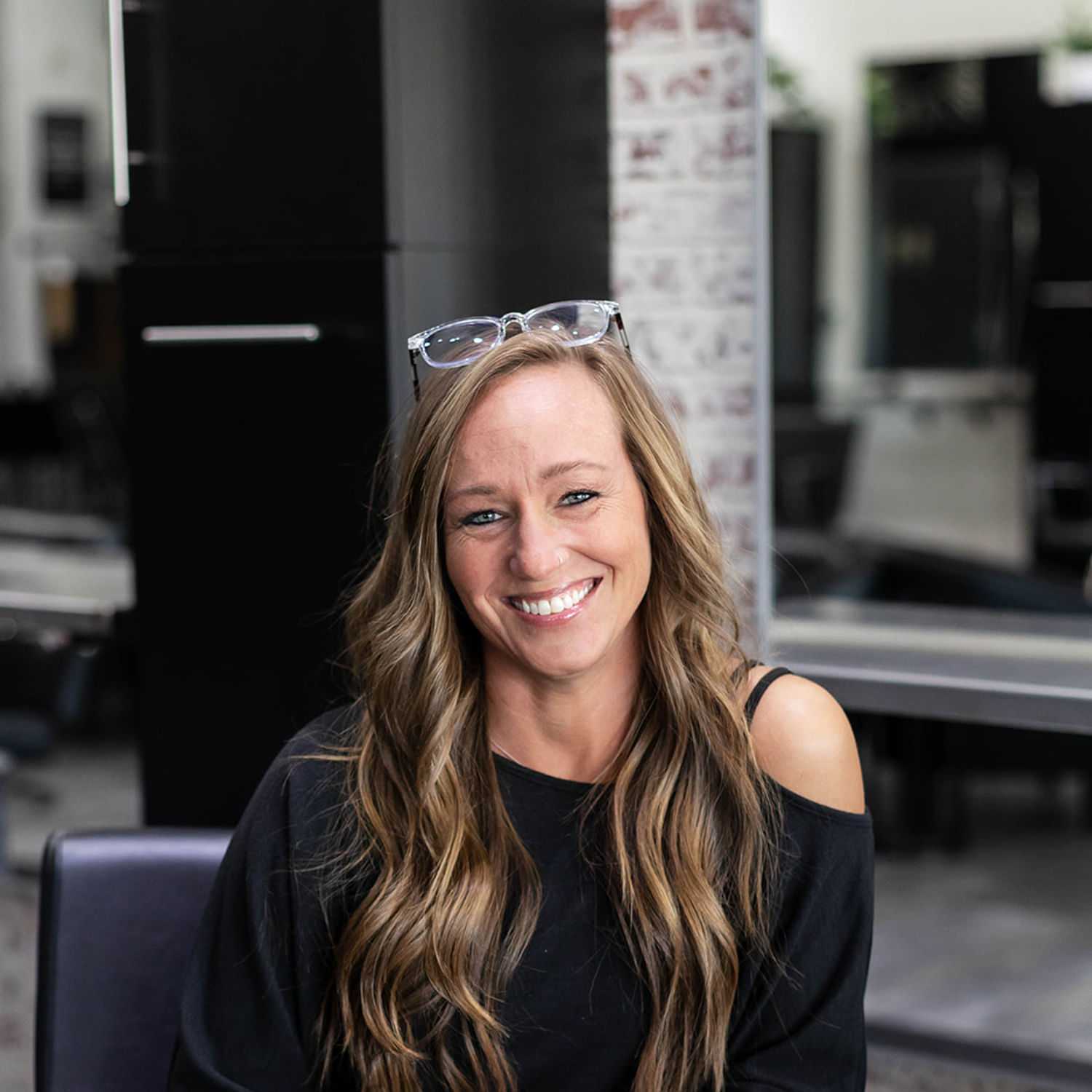 Portrait of Olivia Cater, a professional stylist at Salon361, showcasing their expertise and style.