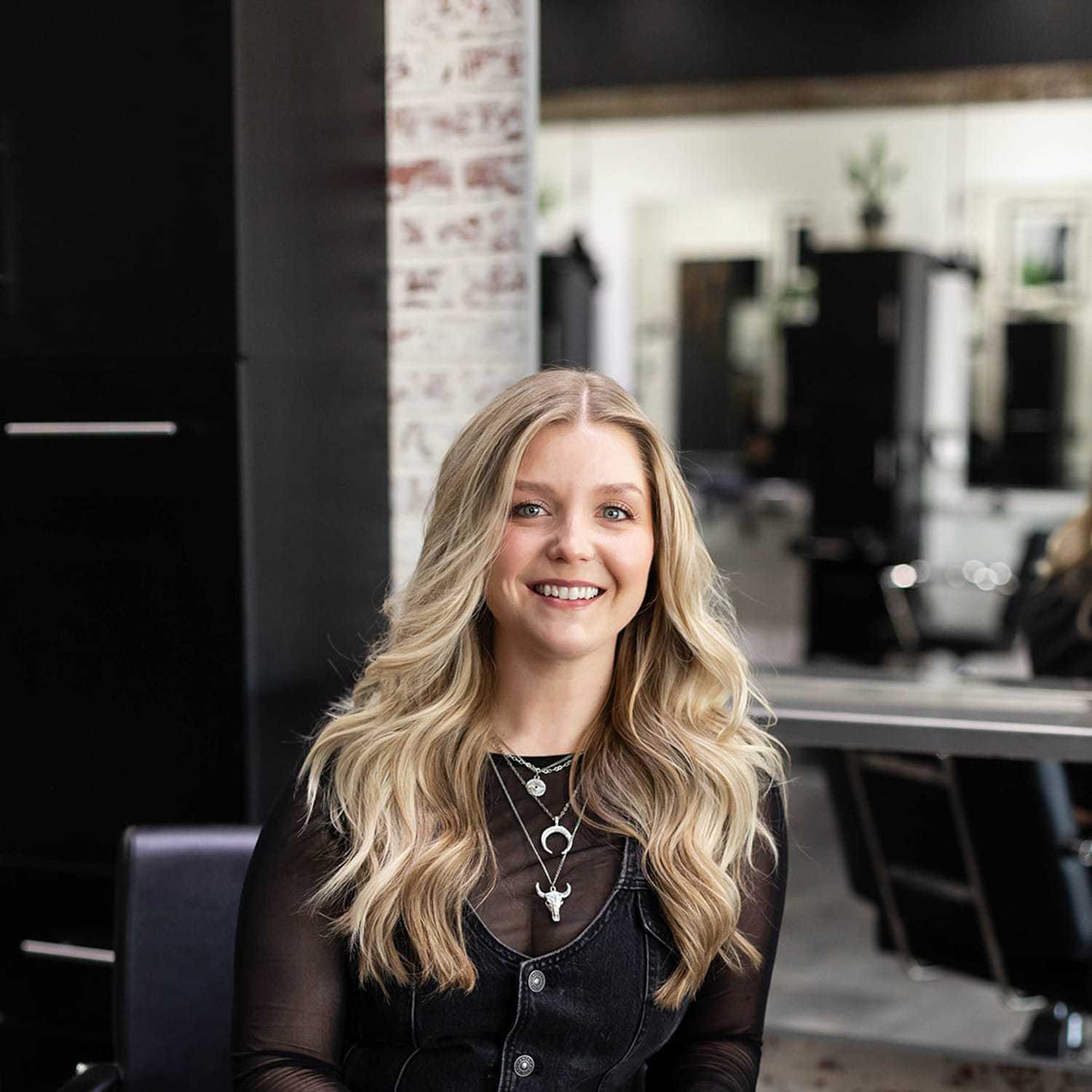 Portrait of Heather Colopy, a professional stylist at Salon361, showcasing their expertise and style.