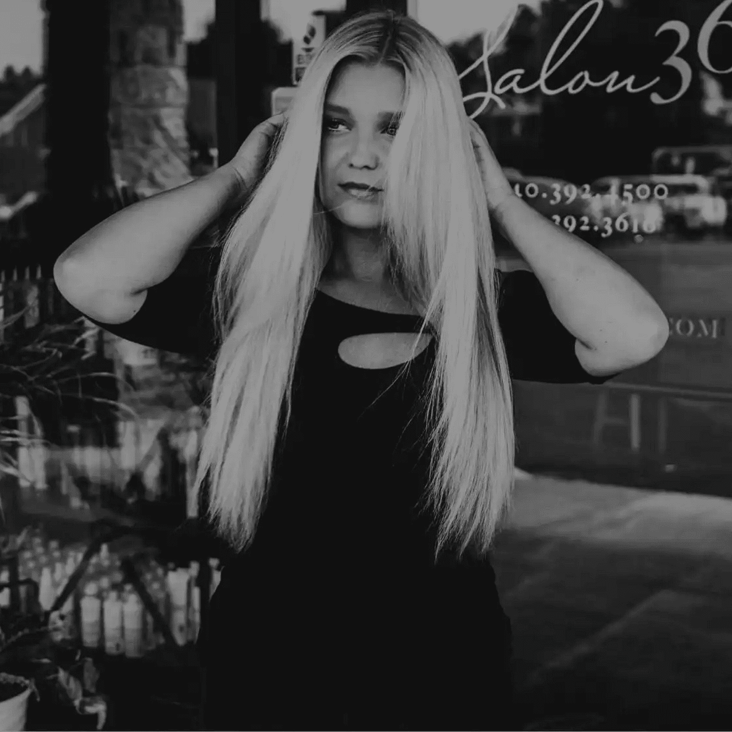 Portrait of Heather Colopy, a professional stylist at Salon361, showcasing their expertise and style.