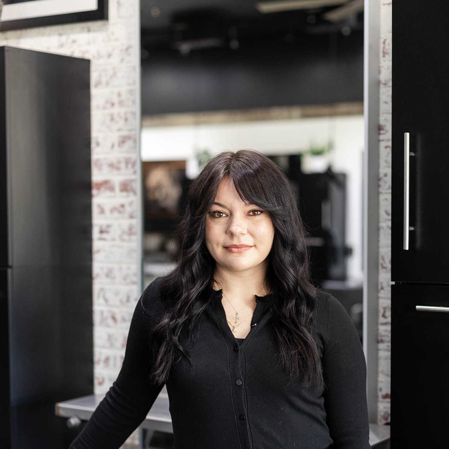 Portrait of Sara Henthorn, a professional stylist at Salon361, showcasing their expertise and style.