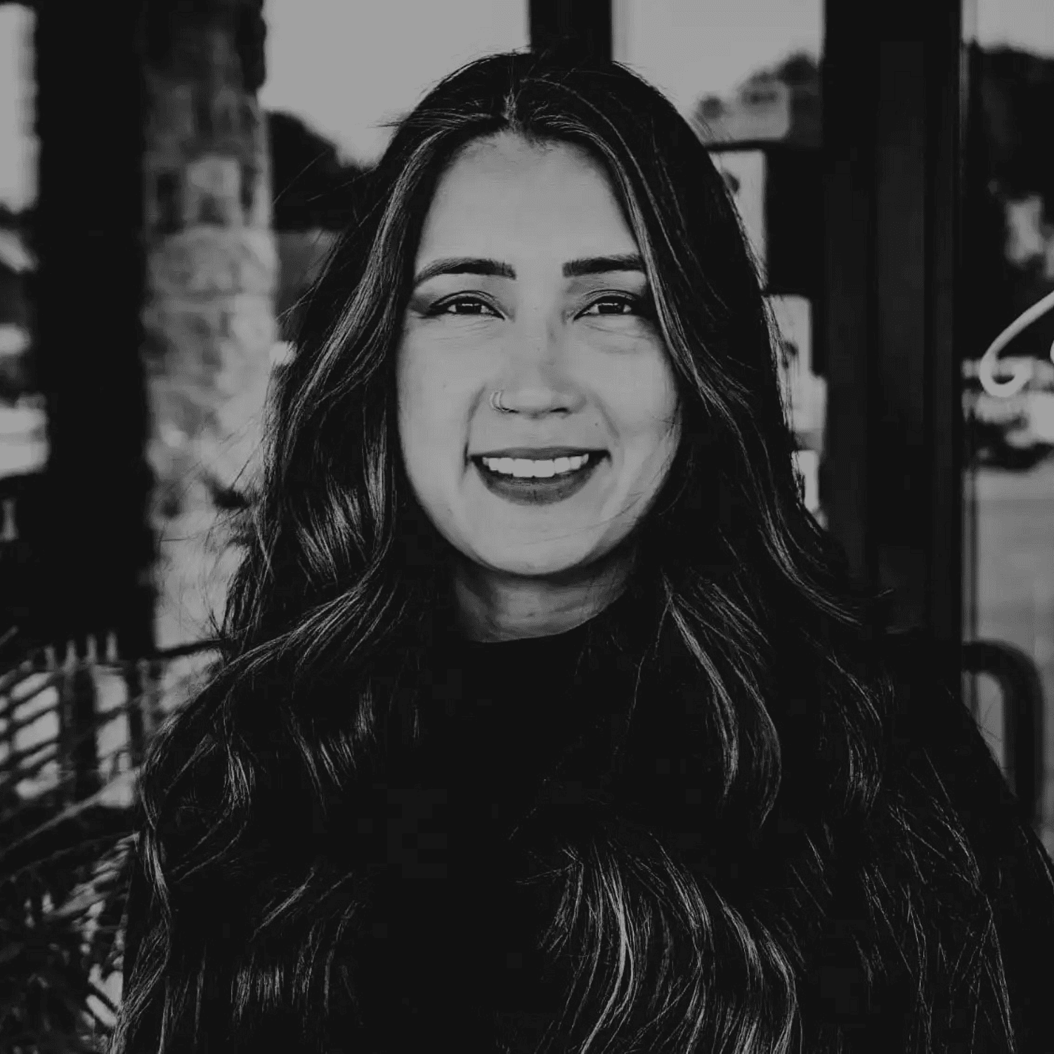 Portrait of Jayme Colopy, a professional stylist at Salon361, showcasing their expertise and style.
