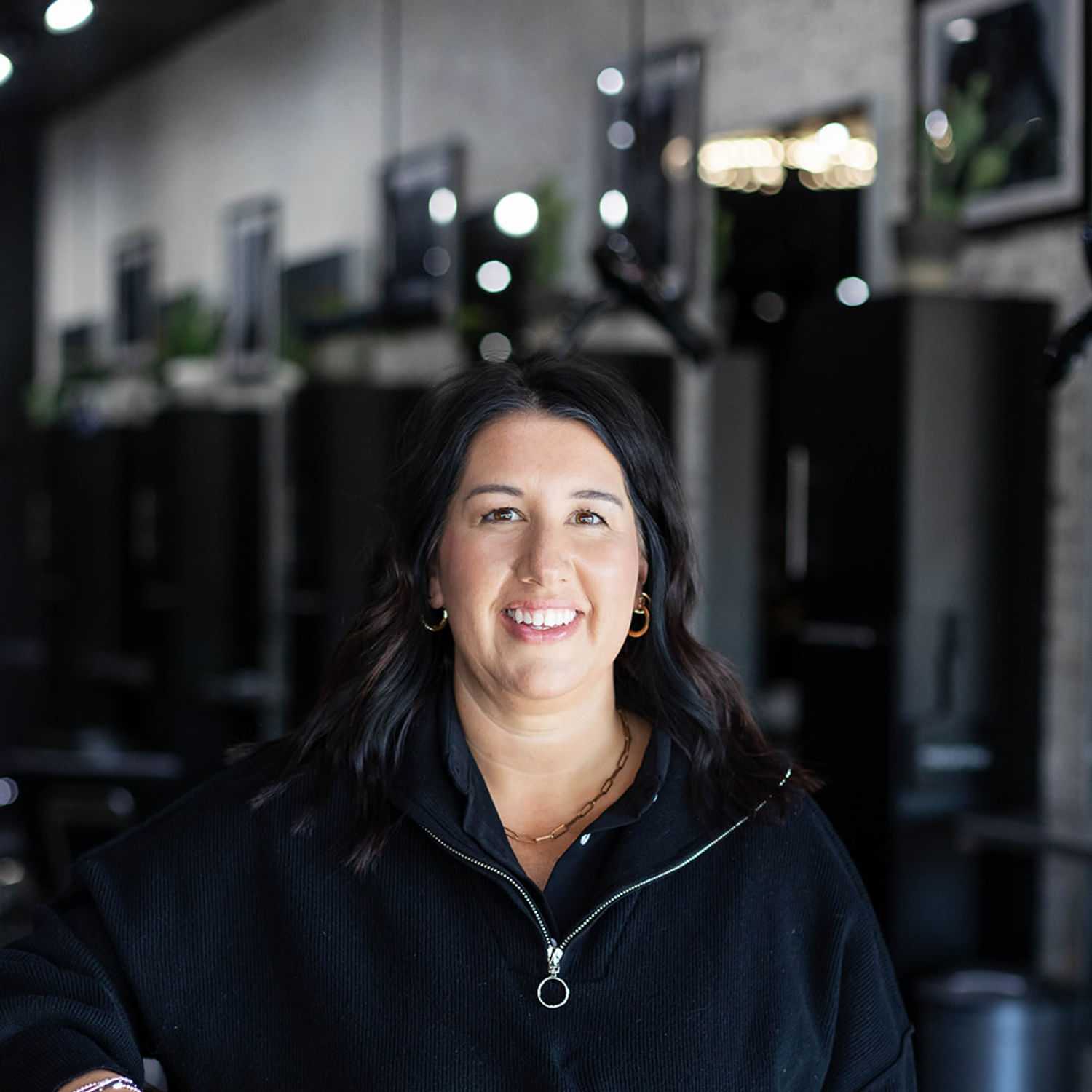 Portrait of Maribeth Waers, a professional stylist at Salon361, showcasing their expertise and style.