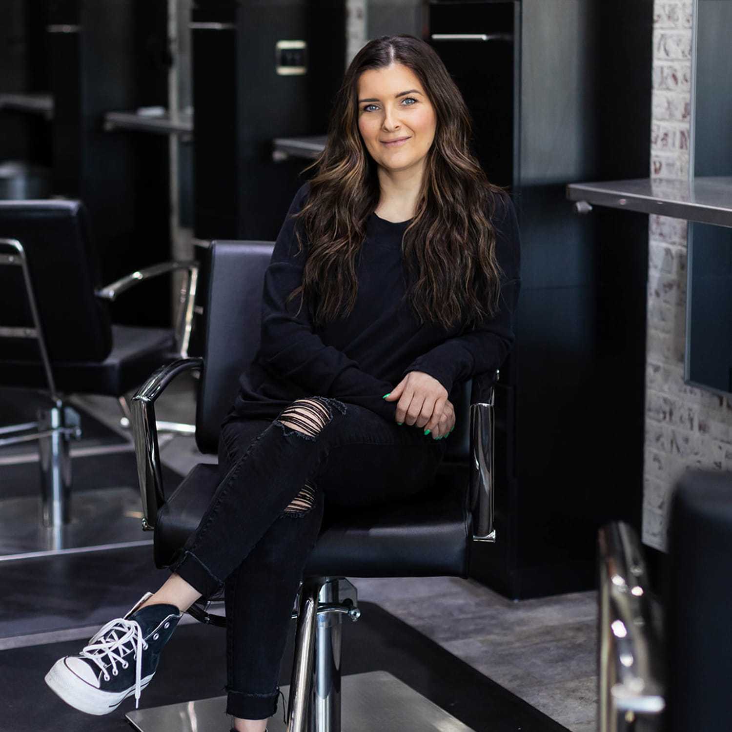 Portrait of Abby DeCosky, a professional stylist at Salon361, showcasing their expertise and style.