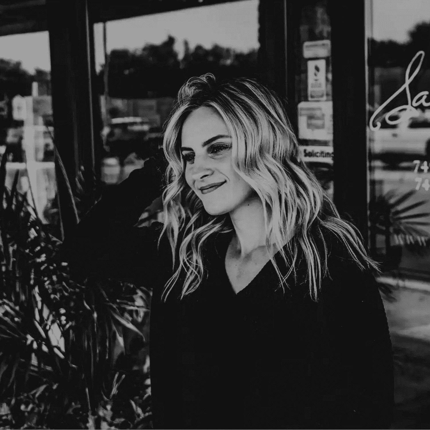 Portrait of Sophie, a professional stylist at Salon361, showcasing their expertise and style.